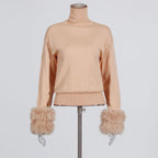 Knitwear with fur top