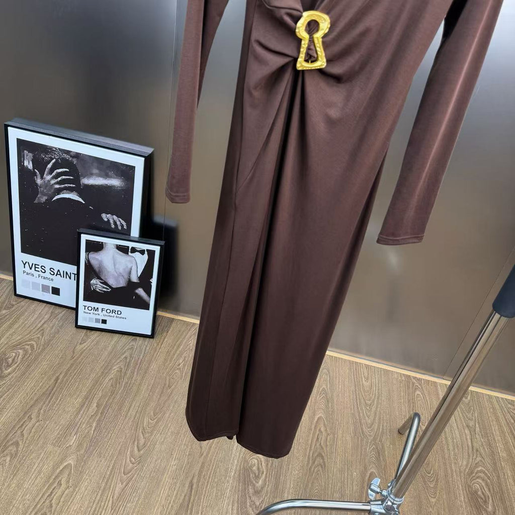 Jersey maxi dress with metallic decor at the waist