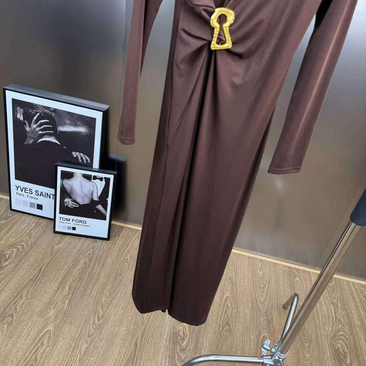 Jersey maxi dress with metallic decor at the waist