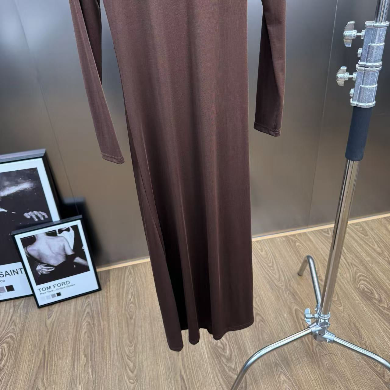 Jersey maxi dress with metallic decor at the waist