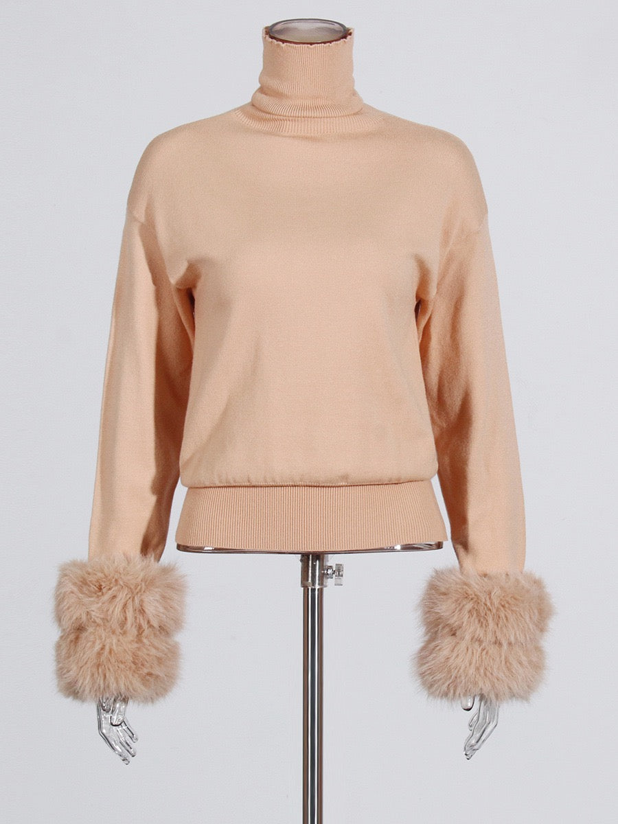 Knitwear with fur top