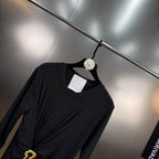 Jersey maxi dress with metallic decor at the waist