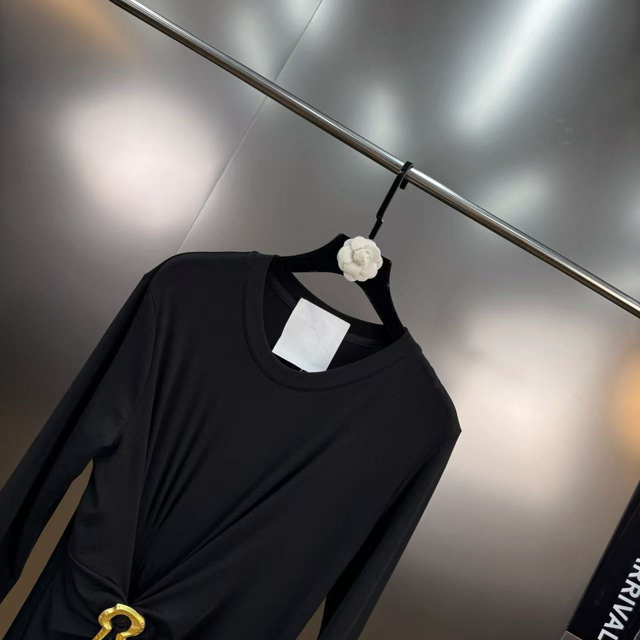 Jersey maxi dress with metallic decor at the waist