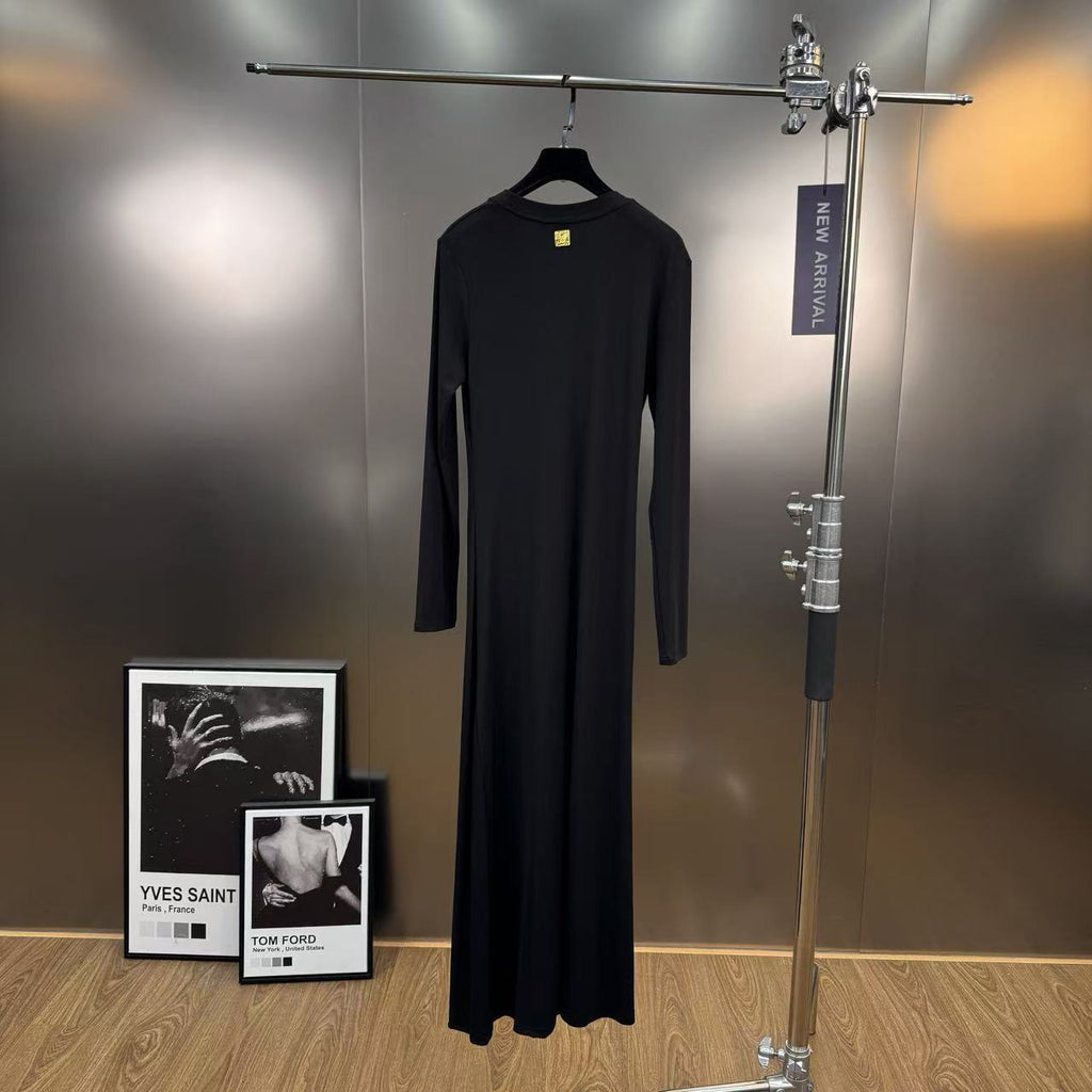 Jersey maxi dress with metallic decor at the waist