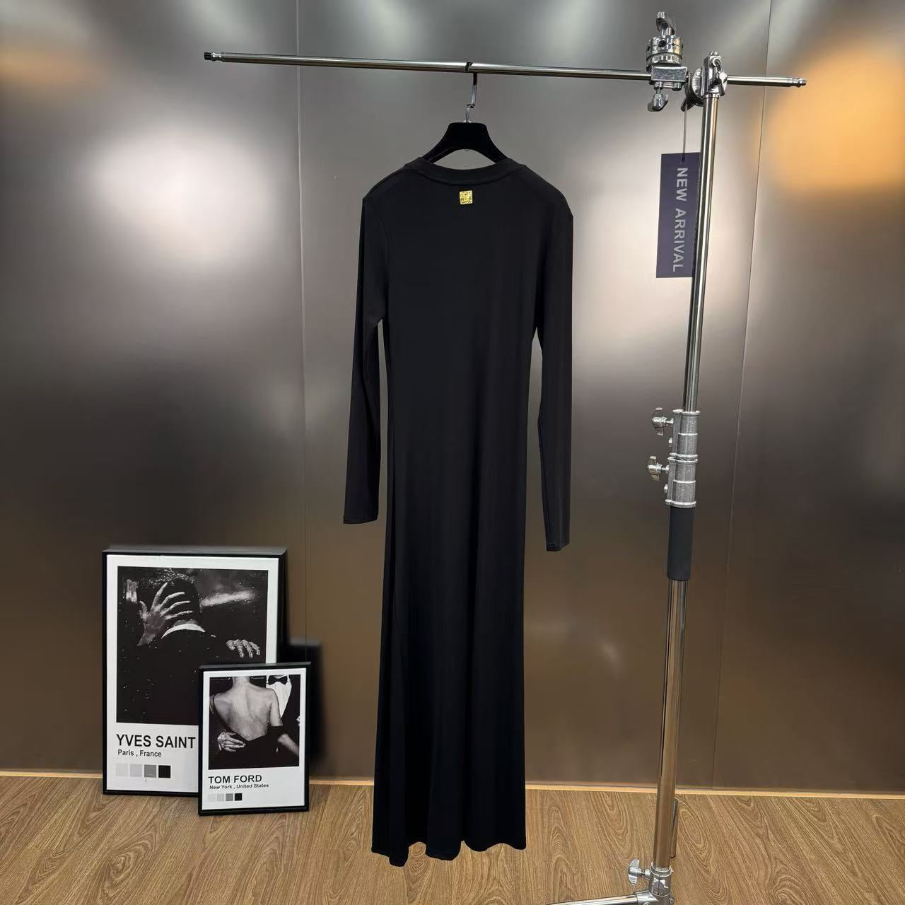 Jersey maxi dress with metallic decor at the waist