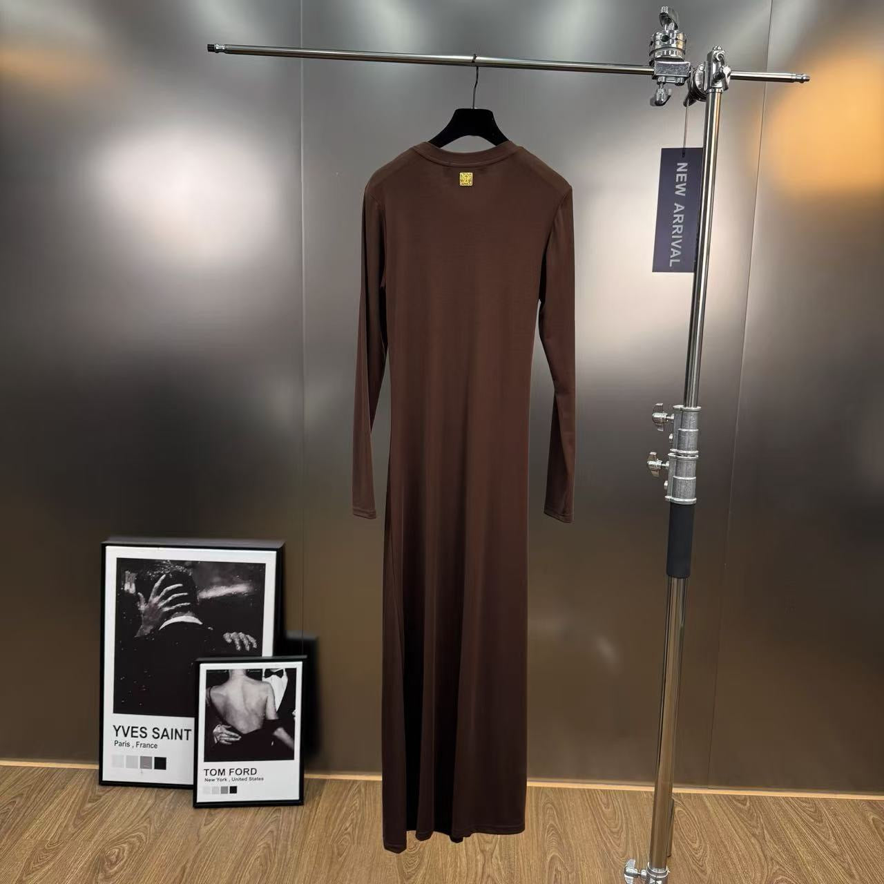 Jersey maxi dress with metallic decor at the waist