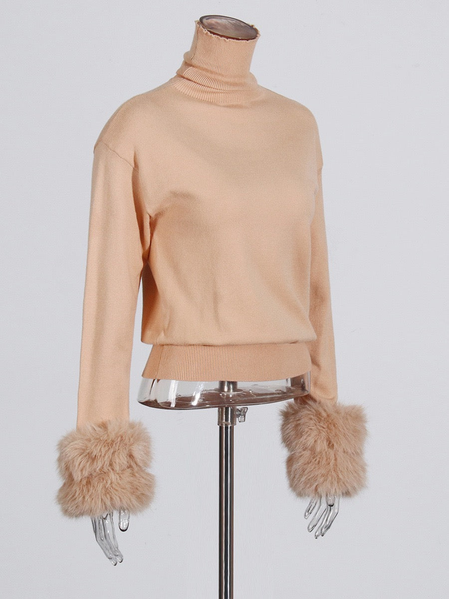 Knitwear with fur top