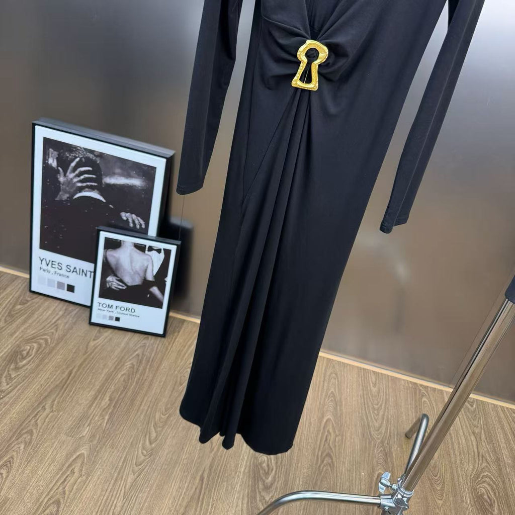 Jersey maxi dress with metallic decor at the waist