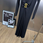 Jersey maxi dress with metallic decor at the waist