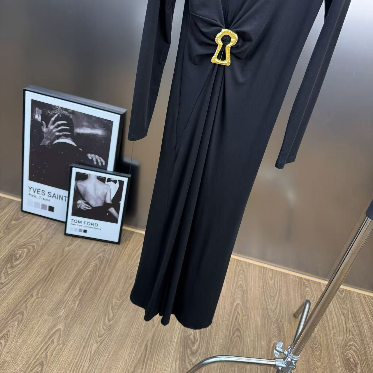 Jersey maxi dress with metallic decor at the waist