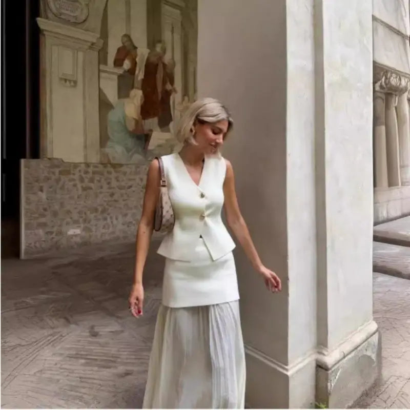 Elegant Plum Two-Piece Set – Sleeveless Button Vest & Pleated Midi Skirt