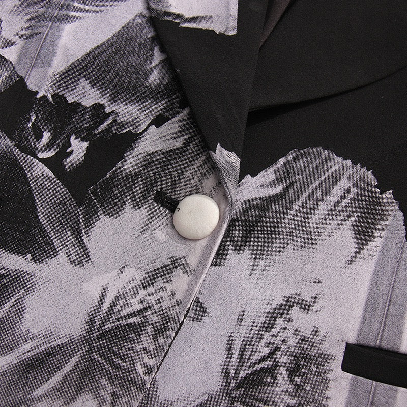 Elegant asymmetric suit